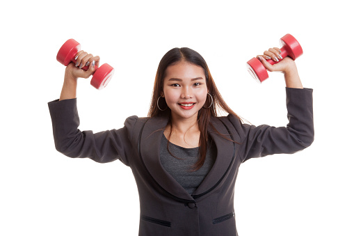 Healthy Asian business woman with dumbbells  isolated on white background.