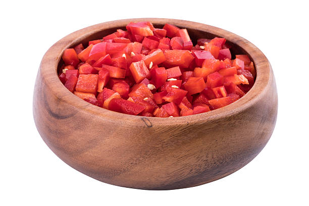istock Sliced red pepper in a wooden bowl. 637232682