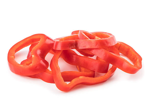 istock sweet peppers sliced in pieces on white background. 637233172