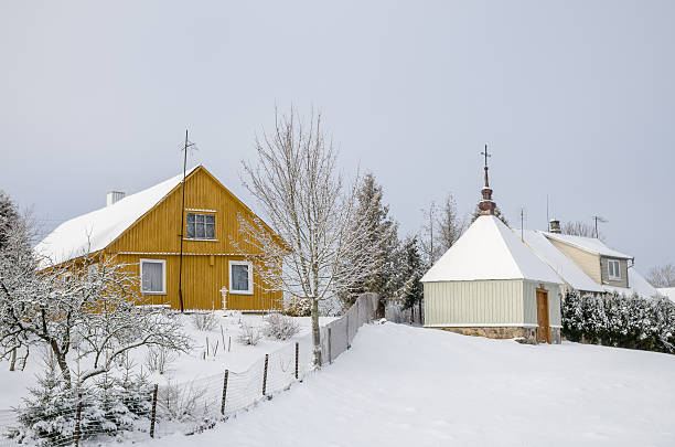 istock Winter landscape with village houses 637234678