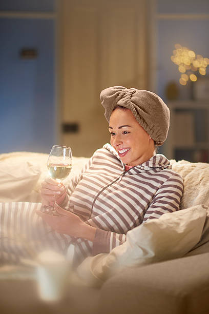 istock treating herself to a night in 637235818