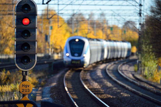 istock Train closing in. Focus on light, trainfront out of focus. 637245516