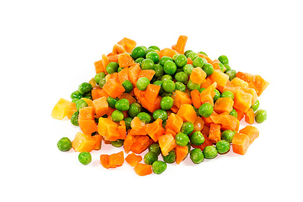 istock Fresh Green Peas with Carrots 637261542