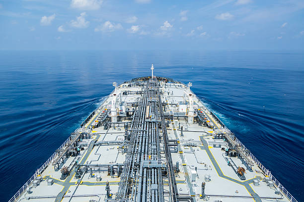 istock Grey oil tanker in calm blue ocean. 637261922