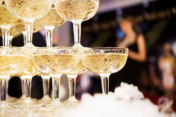 istock champagne glasses standing in a tower at the party 637263646