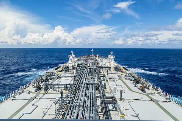 istock Grey oil tanker in calm blue ocean. 637264414