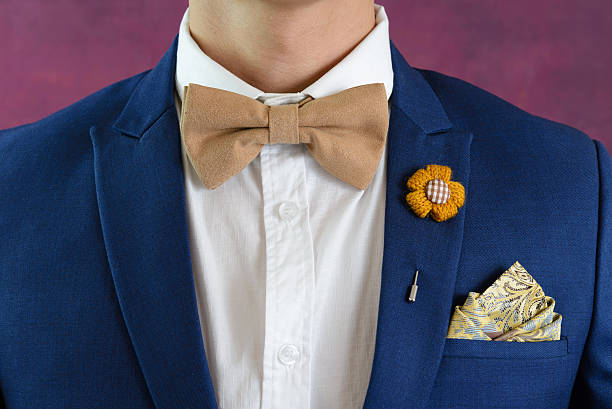 istock man in blue suit bowtie, pocket square 637267090