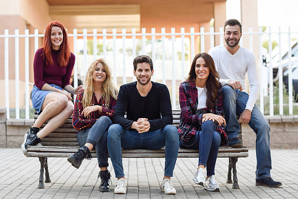 istock Group of young people together outdoors in urban background 637267212