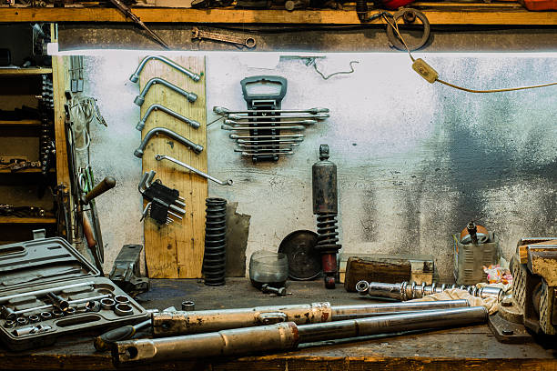 istock Motorcycle parts on the desktop in the garage 637267580