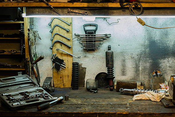 istock Motorcycle parts on the desktop in the garage 637267668