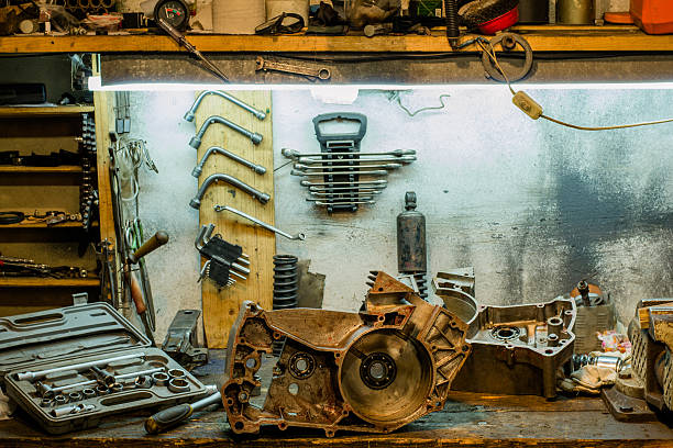istock Motorcycle parts on the desktop in the garage 637268338