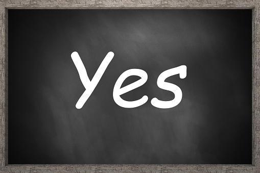 yes written on black chalkboard 3D Illustration