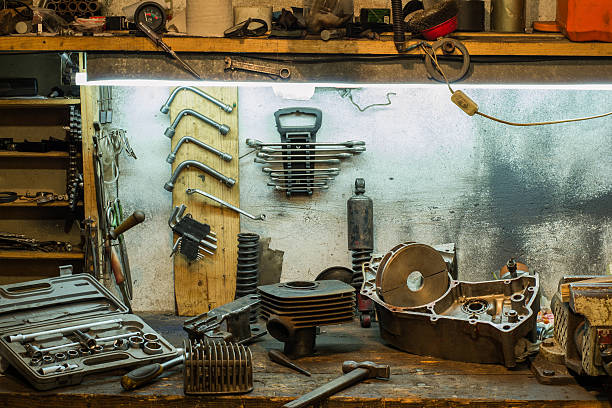 istock Motorcycle parts on the desktop in the garage 637268548
