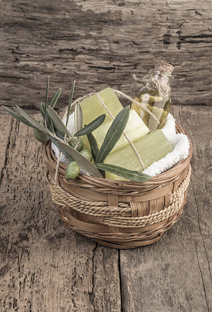 istock natural olive oil soap bars and olive oil on table 637270048