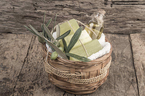 istock natural olive oil soap bars and olive oil on table 637271522