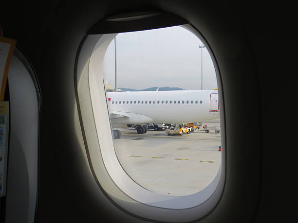istock Airport part from airplane window 637273072