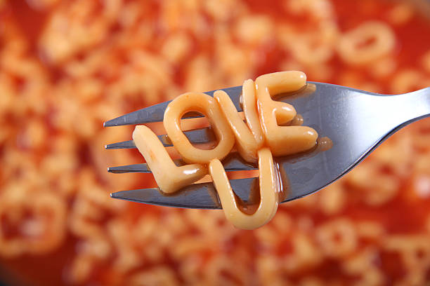 istock 'Love U' written in spaghetti pasta letters for Valentines Day. 637275500