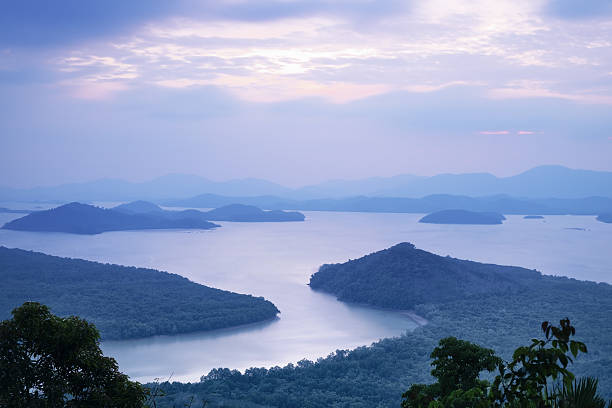 istock island in fog river 637276024