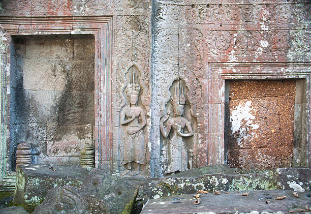 istock Carvings at Ta Prohm temple at Angkor, Cambodia. 637277332
