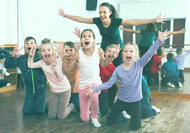 Cheerful children  in dance studio having fun Cheerful children  in dance studio smiling and having fun number 10 stock pictures, royalty-free photos & images