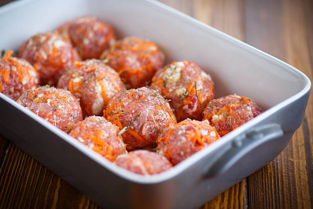 istock raw meatballs tangled meat with carrots 637278574