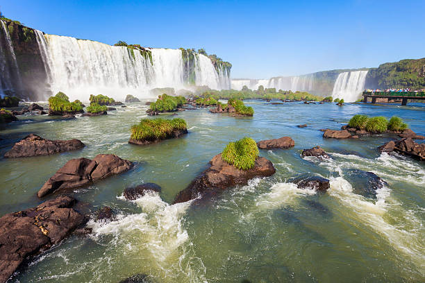 The Iguazu Falls Iguazu Falls (Cataratas del Iguazu) are waterfalls of the Iguazu River on the border of the Argentina and the Brazil. Iguazu are the largest waterfalls system in the world. paraguay stock pictures, royalty-free photos & images