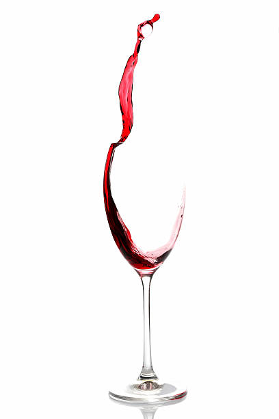 istock red wine poured from a glass 637281512