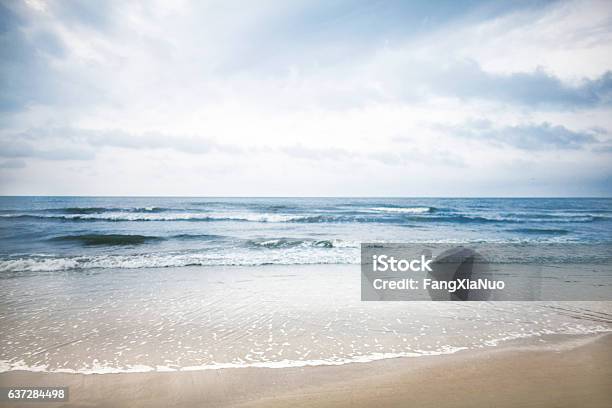 View Of Beach And Clouds Stock Photo - Download Image Now - Beach, Sea, Wave - Water