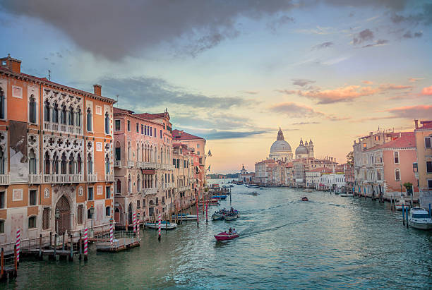 Grand Canal View. Evening view of the Grand Canal in Venice, Italy. Taken from Accademia Bridge with the  Basilica di Santa Maria della Salute in the distance. venice italy stock pictures, royalty-free photos & images