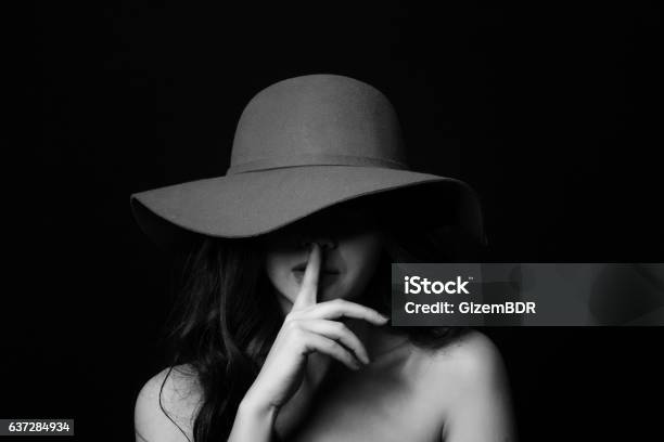 Keeping A Secret Stock Photo - Download Image Now - Women, Mystery, One Woman Only