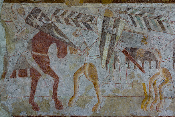 istock Medieval fresco of a cavalry battle 637285404
