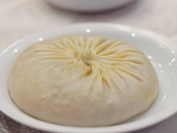 istock Closeup of Single steamed bun. 637286588
