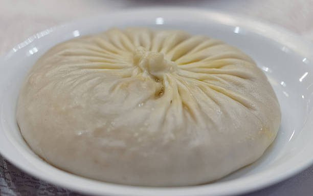 istock Closeup of Single steamed bun. 637286598