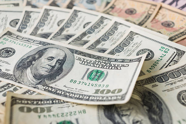 istock Close up heap of dollars money 637290988