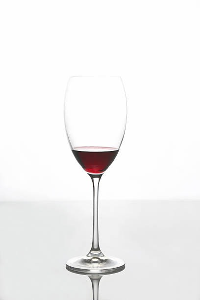 istock glass with red wine on a light background 637295832