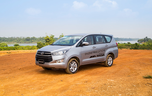 Hanoi, Vietnam - Nov 17, 2016: Toyota Innova 2016 car on test drive road in Vietnam