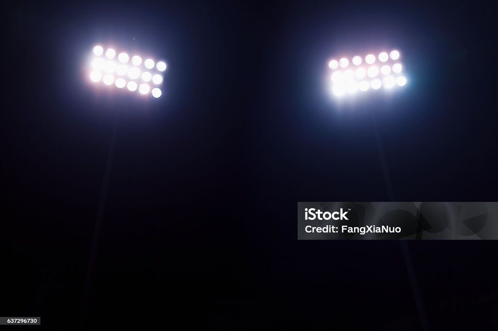 View of stadium lights at night Floodlight Stock Photo