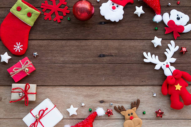 istock Christmas decorations and gift boxes on wood background. 637296854