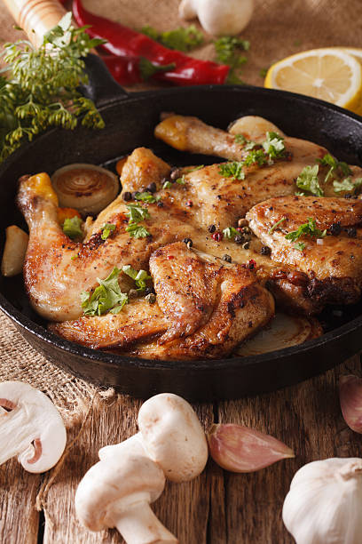 istock Hot Fried Chicken Tabaka with ingredients close-up. vertical 637301450