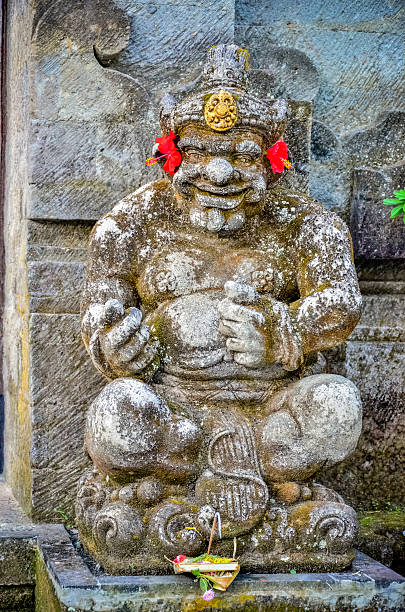 istock ancient god statues with smile at Bali 637301852