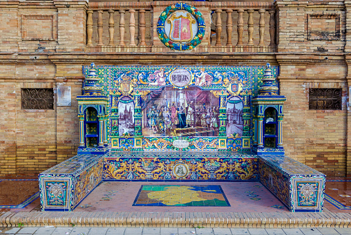 Glazed tiles bench of spanish province of Burgos at Plaza de Espana, Seville, Spain