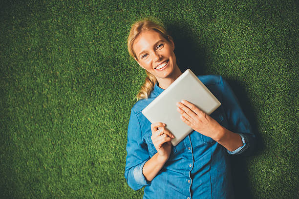 istock Young woman with tablet 637304106