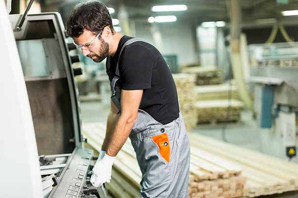 istock Man working in factory 637304402
