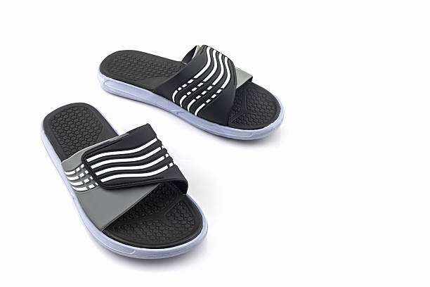 istock Sandals shoes. Black color flip flops. 637304740