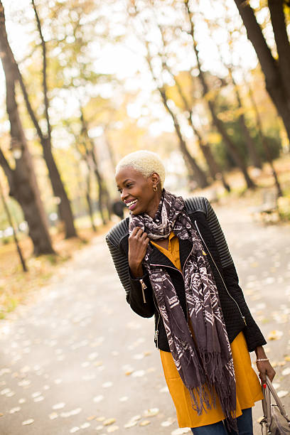 istock Black woman in park 637305292