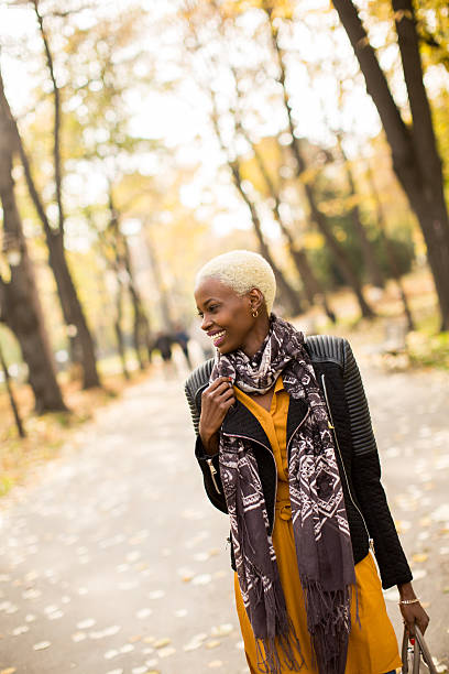 istock Black woman in park 637305344