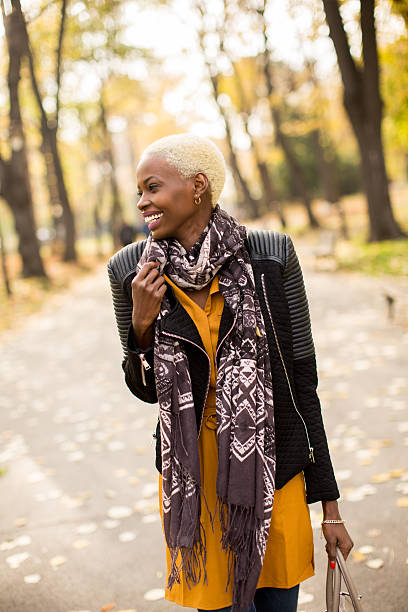 istock Black woman in park 637305378