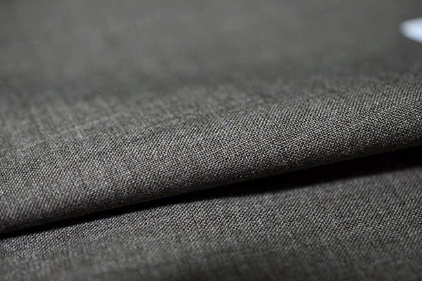 istock close up roll dark gray fabric of sui 637306970