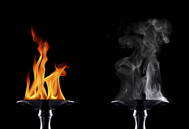 istock smokey and burning flaming torches 637308528