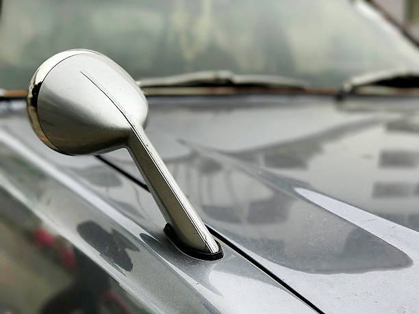 istock side rear view mirror of a classic car 637308846